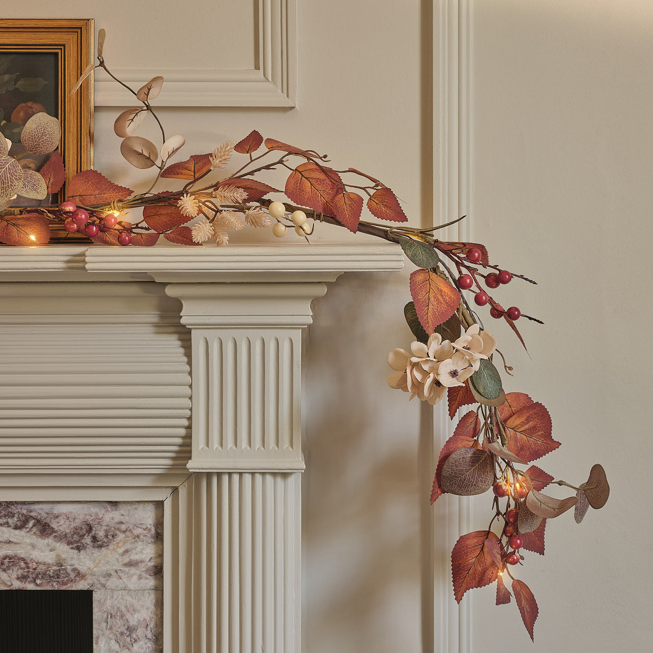Pre-lit autumn foliage garland with berries and warm white lights
