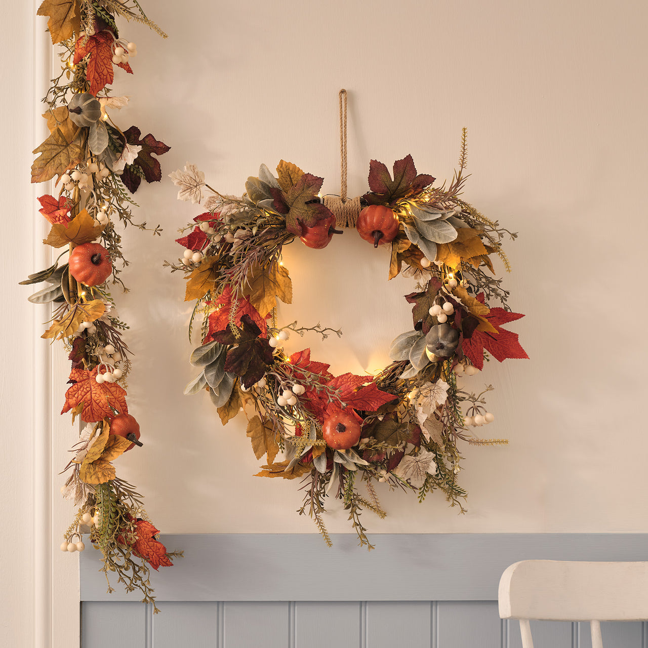 Pre-lit pumpkin lane autumn wreath and garland with warm white lights