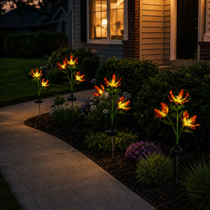 Solar fire lily garden lights welcoming guests along a front entry